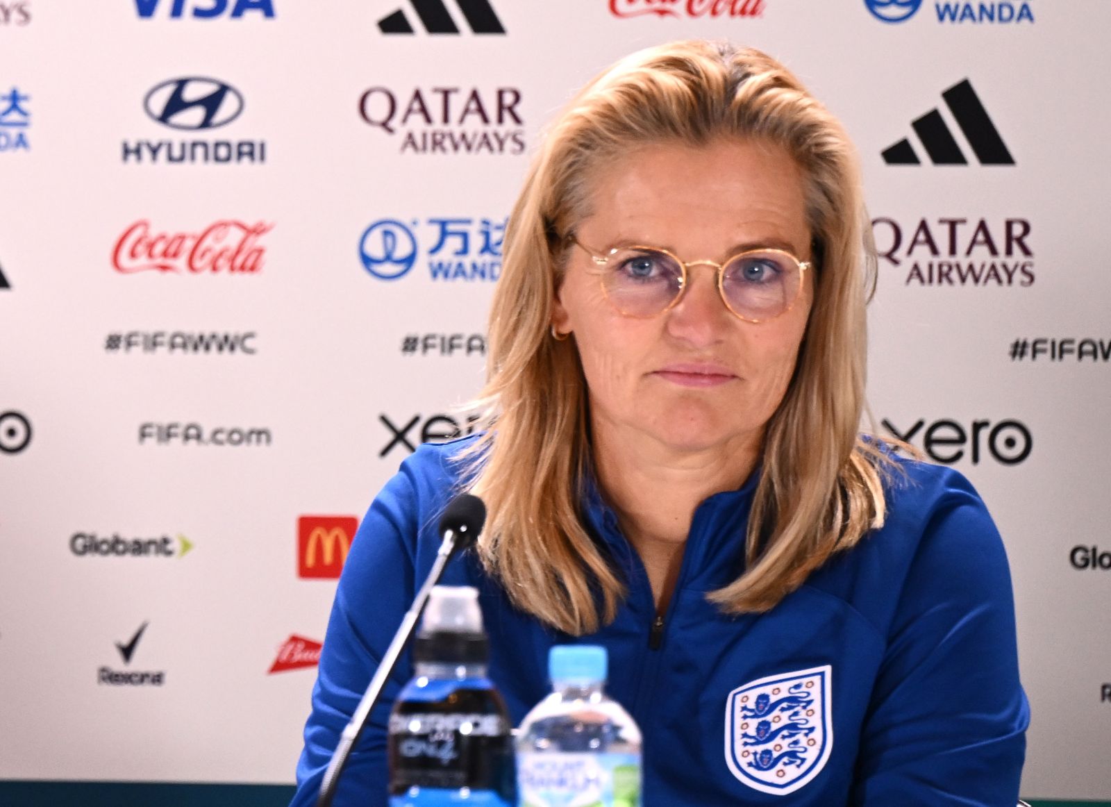 epa10801057 England head coach Sarina Wiegman (R) and captain Millie Bright speak to media during a team England press conference at Stadium Australia in Sydney, Australia, 15 August 2023.  EPA/DAN HIMBRECHTS AUSTRALIA AND NEW ZEALAND OUT