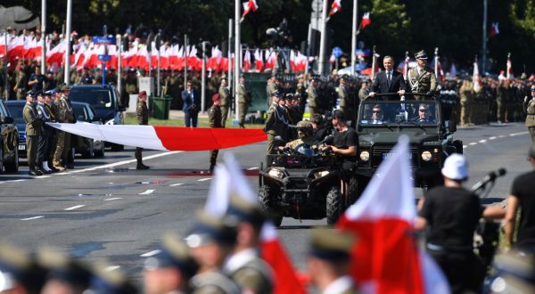 epa10801372 Polish President Andrzej Duda (2R) and Polish Chief of General Staff Gen. Rajmund Andrzejczak (R) take part in the military parade during the Polish Armed Forces Day in Warsaw, Poland, 15 August 2023.  Polish Armed Forces Day is a national holiday celebrated annually on 15 August in Poland, commemorating the anniversary of the 1920 victory over Soviet Russia at the Battle of Warsaw during the Polish-Soviet War.  EPA/Radek Pietruszka POLAND OUT