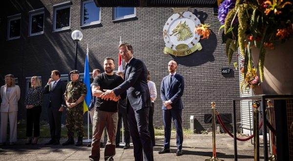epa10809269 Ukrainian President Volodymyr Zelensky (L) is welcomed by Dutch outgoing Prime Minister Mark Rutte during Zelensky's visit at Eindhoven Air Base, in Eindhoven, the Netherlands, 20 August 2023.  EPA/ROB ENGELAAR