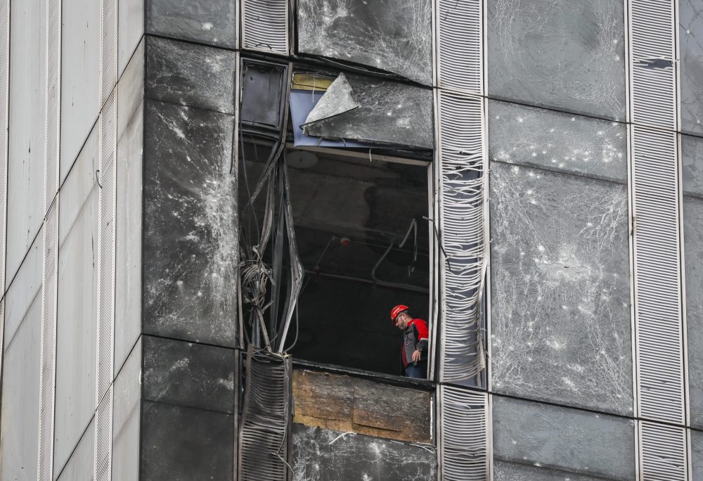epaselect epa10814856 A worker inside a damaged building in the Moscow-City business center after a drone reportedly fell, in Moscow, Russia, 23 August 2023. The Russian Defence Ministry reported that the air defense forces stopped an attempt by Ukraine to carry out an attack by three unmanned aerial vehicles in Moscow. ‘Two of the drones were destroyed by air defense in the air over the territory of Mozhaisk and Khimki districts of the Moscow region. The third UAV was suppressed by electronic warfare and, having lost control, collided with the building of the Moscow City business center,’ the Russian Defence Ministry said.  EPA/YURI KOCHETKOV
