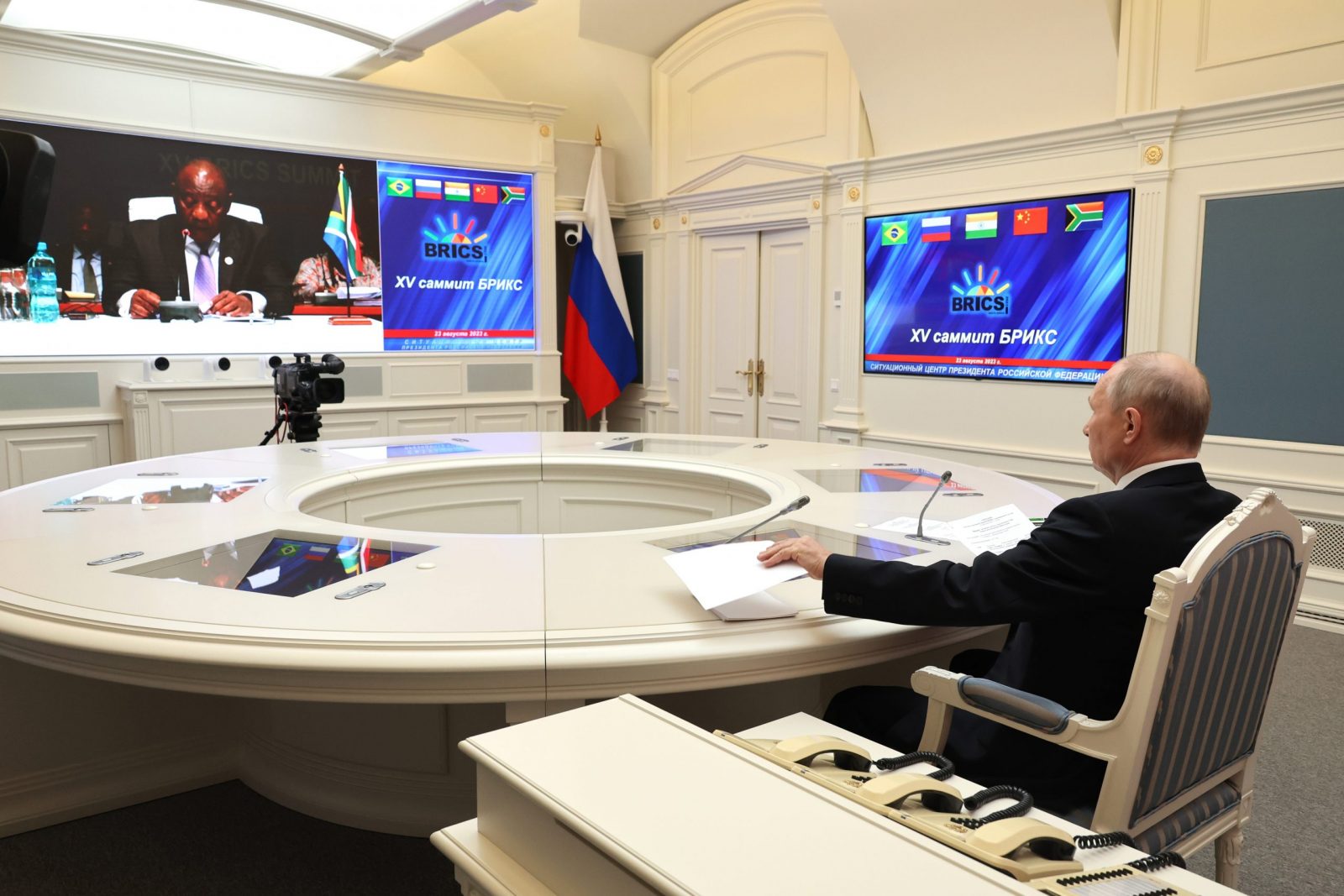 epa10815530 Russian President Vladimir Putin (R) attends the 15th BRICS Summit via video link in Moscow, Russia, 22 August 2023 (Issued on 23 August 2023). South Africa is hosting the 15th BRICS Summit, (Brazil, Russia, India, China and South Africa), as the group's economies account for a quarter of global gross domestic product. Dozens of leaders of other countries in Africa, Asia and the Middle East are also attending the summit.  EPA/MIKHAEL KLIMENTYEV / SPUTNIK / KREMLIN POOL