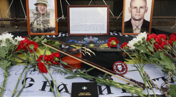 epa10817921 Pictures of PMC Wagner chief Yevgeny Prigozhin and PMC Wagner commander Dmitry Utkin are seen on an informal memorial in downtown of Rostov-on Don, Russia, 24 August 2023. An investigation was launched into the crash of an aircraft in the Tver region in Russia on 23 August 2023, the Russian Federal Air Transport Agency said in a statement. Among the passengers was Wagner chief Yevgeny Prigozhin, the agency reported.  EPA/STRINGER