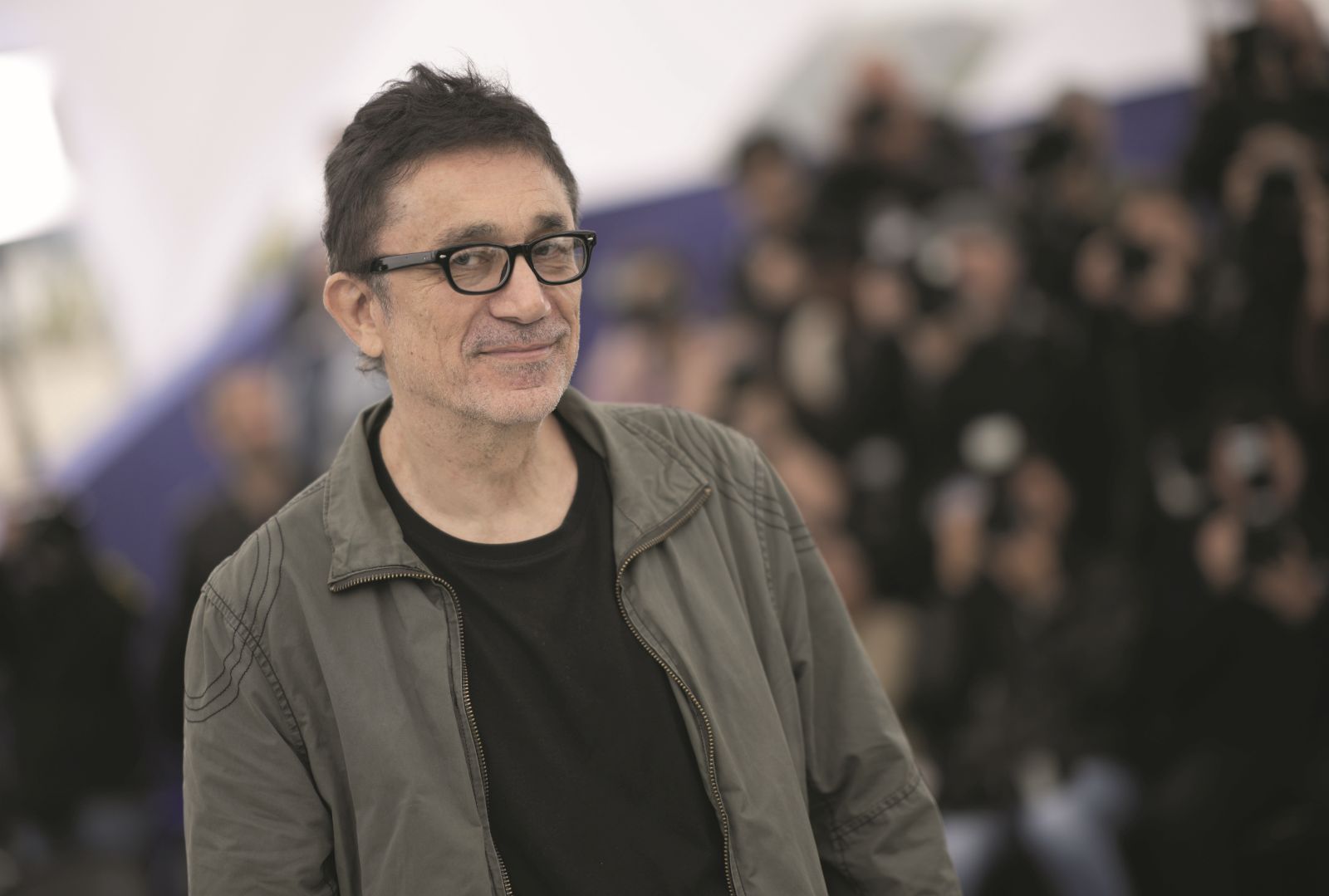 Director Nuri Bilge Ceylan poses for photographers at the photo call for the film 'About Dry Grasses' at the 76th international film festival, Cannes, southern France, Saturday, May 20, 2023. (AP Photo/Daniel Cole)