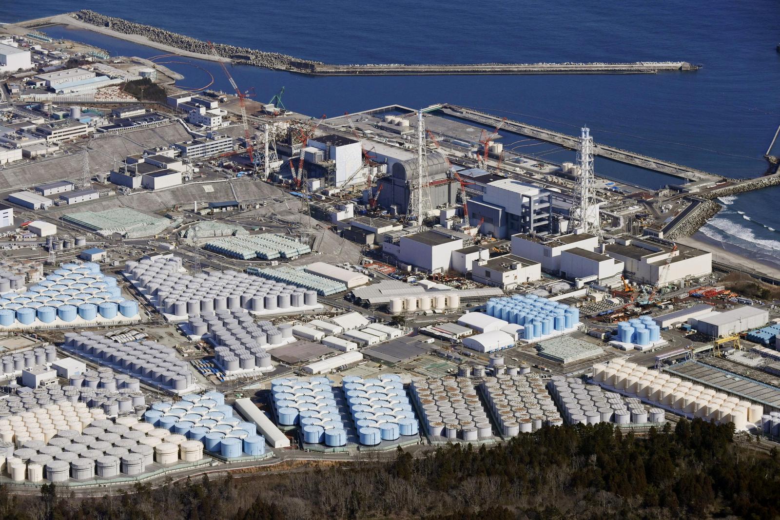 FILE PHOTO: An aerial view shows the storage tanks for treated water at the tsunami-crippled Fukushima Daiichi nuclear power plant in Okuma town, Fukushima prefecture, Japan February 13, 2021, in this photo taken by Kyodo. Picture taken February 13, 2021. Kyodo/via REUTERS ATTENTION EDITORS - THIS IMAGE WAS PROVIDED BY A THIRD PARTY. MANDATORY CREDIT. JAPAN OUT. NO COMMERCIAL OR EDITORIAL SALES IN JAPAN/File Photo Photo: KYODO/REUTERS