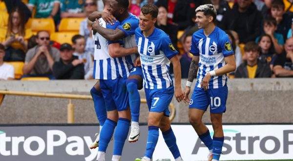 Soccer Football - Premier League - Wolverhampton Wanderers v Brighton & Hove Albion - Molineux Stadium, Wolverhampton, Britain - August 19, 2023 Brighton & Hove Albion's Pervis Estupinan celebrates scoring their second goal with Solly March, Julio Enciso and teammates Action Images via Reuters/Andrew Boyers Action Images via Reuters/Andrew Boyers EDITORIAL USE ONLY. No use with unauthorized audio, video, data, fixture lists, club/league logos or 'live' services. Online in-match use limited to 75 images, no video emulation. No use in betting, games or single club /league/player publications.  Please contact your account representative for further details.  REFILE - CORRECTING CAPTION Photo: Andrew Boyers/REUTERS