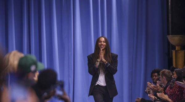 Designer Olivier Rousteing accepts applause after the Balmain Spring/Summer 2024 womenswear fashion collection presented Wednesday, Sept. 27, 2023 in Paris. (AP Photo/Vianney Le Caer)