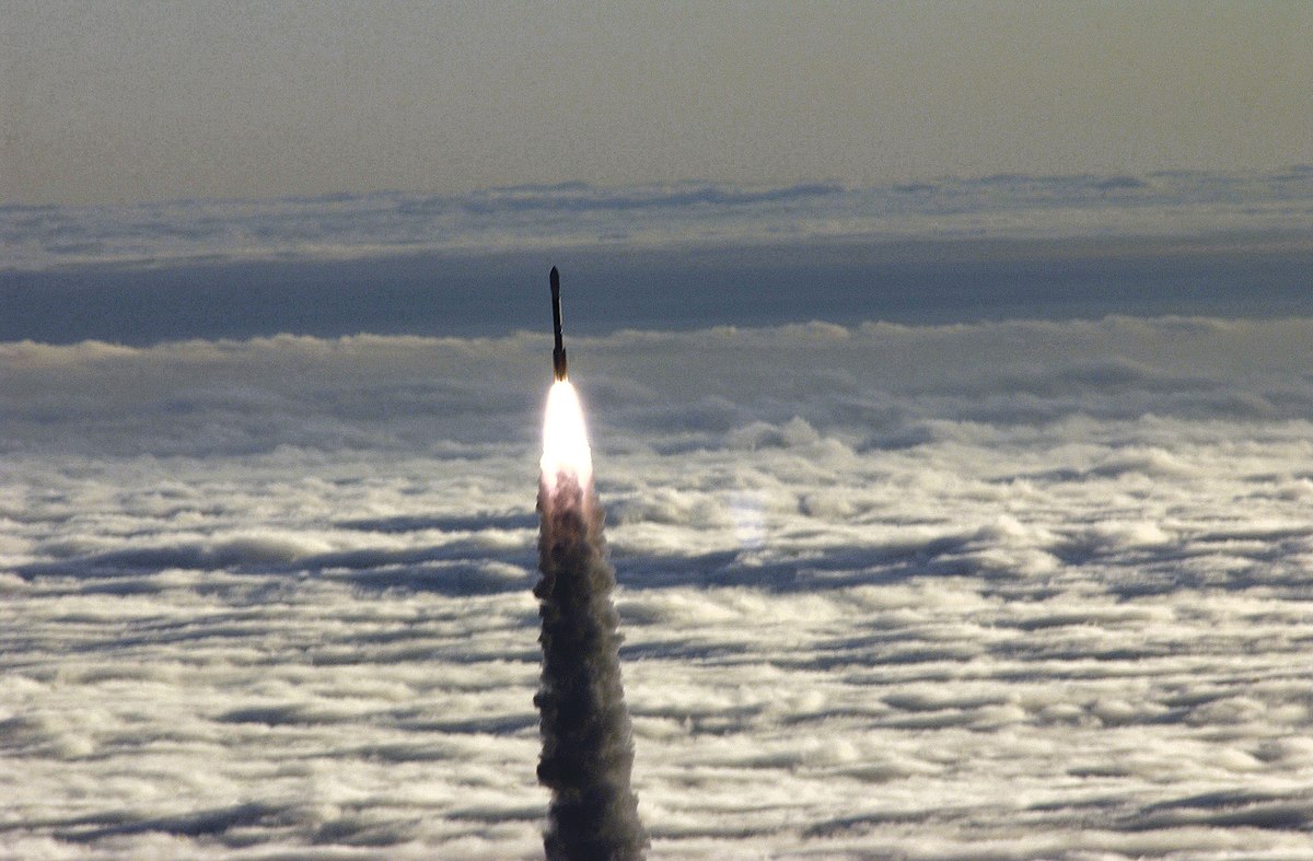 A Boeing Delta II rocket soars above the clouds over Vandenberg Air Force Base (AFB), California, carrying a National Aeronautics and Space Administration (NASA) Earth Observing System (EOS) set of satellites designed to monitor ocean levels and measure other environmental sciences.