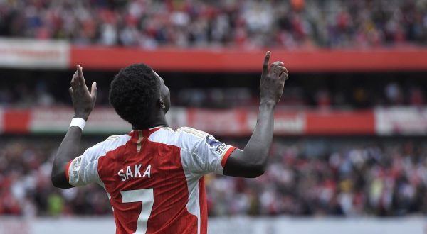 epa10796837 Bukayo Saka of Arsenal celebrates after scoring the 2-0 lead during the English Premier Leage soccer match between Arsenal London and Nottingham Forest in London, Britain, 12 August 2023.  EPA/VINCE MIGNOTT EDITORIAL USE ONLY. No use with unauthorized audio, video, data, fixture lists, club/league logos or 'live' services. Online in-match use limited to 120 images, no video emulation. No use in betting, games or single club/league/player publications