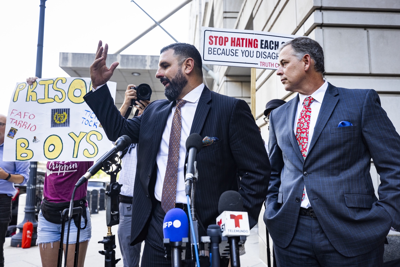 epa10842889 Nayib Hassan (C) and Sabino Jauregui (R), attorneys for ex-Proud Boys leader Enrique Tarrio, speak to the media after Tarrio was sentenced to 22 years for seditious conspiracy in Washington, DC, USA, 05 September 2023. Tarrio was found guilty in May 2024 for seditious conspiracy, among other felonies, for his role in the January 6 attacks on the US Capitol.  EPA/JIM LO SCALZO