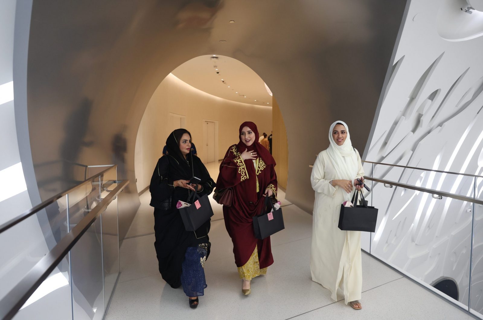 epa10824560 Emirati women arrive at the Abaya Rally event at the Museum of The Future in the Gulf Emirate of Dubai, United Arab Emirates, 27 August 2023. The Abaya Rally is held on the occasion of Emirati Women's Day, which is marked annually in the UAE on 28 August. Fatima bint Mubarak Al Ketbi, wife of the former president of the UAE Sheikh Zayed bin Sultan Al Nahyan, founded Emirati Women's Day in 2015 to award female's efforts and to celebrate their achievements.  EPA/ALI HAIDER
