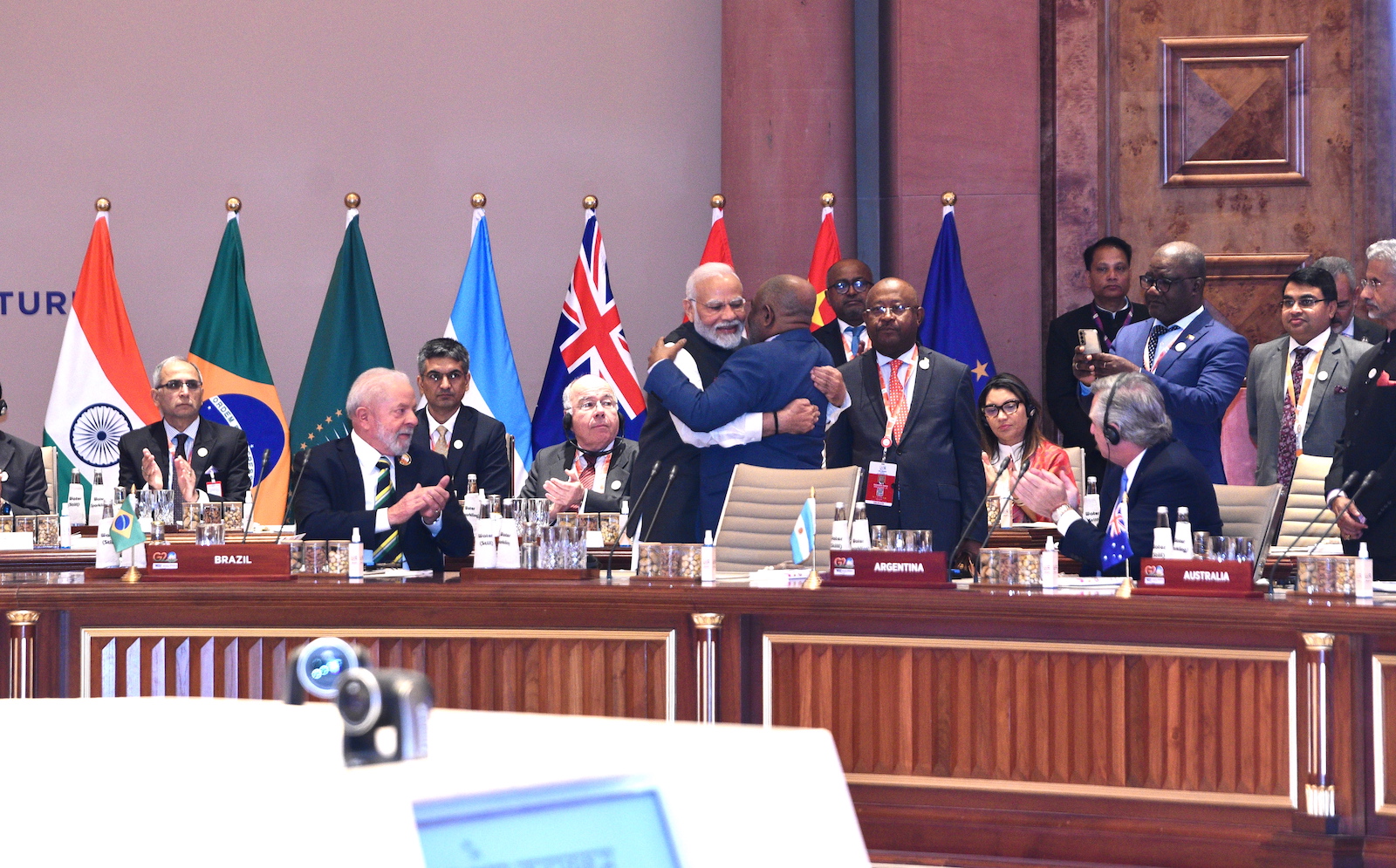 epa10849946 A handout photo made available by the Ministry of External Affairs (MEA) of India shows Indian Prime Minister Narendra Modi (C-L) embracing President of the Union of Comoros and Chairperson of the African Union Azali Assoumani (C-R) during the G20 Summit at ITPO Convention Centre Pragati Maidan in New Delhi, India, 09 September 2023. The G20 Heads of State and Government summit takes place in the Indian capital on 09 and 10 September.  EPA/INDIAN MINISTRY OF EXTERNAL AFFAIRS / HANDOUT  HANDOUT EDITORIAL USE ONLY/NO SALES