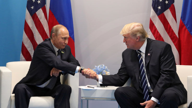 epa06073354 Russian President Vladimir Putin (L) and US President Donald J. Trump (R) shake hands during their meeting on the sidelines of the G20 summit in Hamburg, Germany, 07 July 2017. The G20 Summit (or G-20 or Group of Twenty) is an international forum for governments from 20 major economies. The summit is taking place in Hamburg from 07 to 08 July 2017.  EPA/MICHAEL KLIMENTYEV / SPUTNIK / KREMLIN POOL / POOL MANDATORY CREDIT