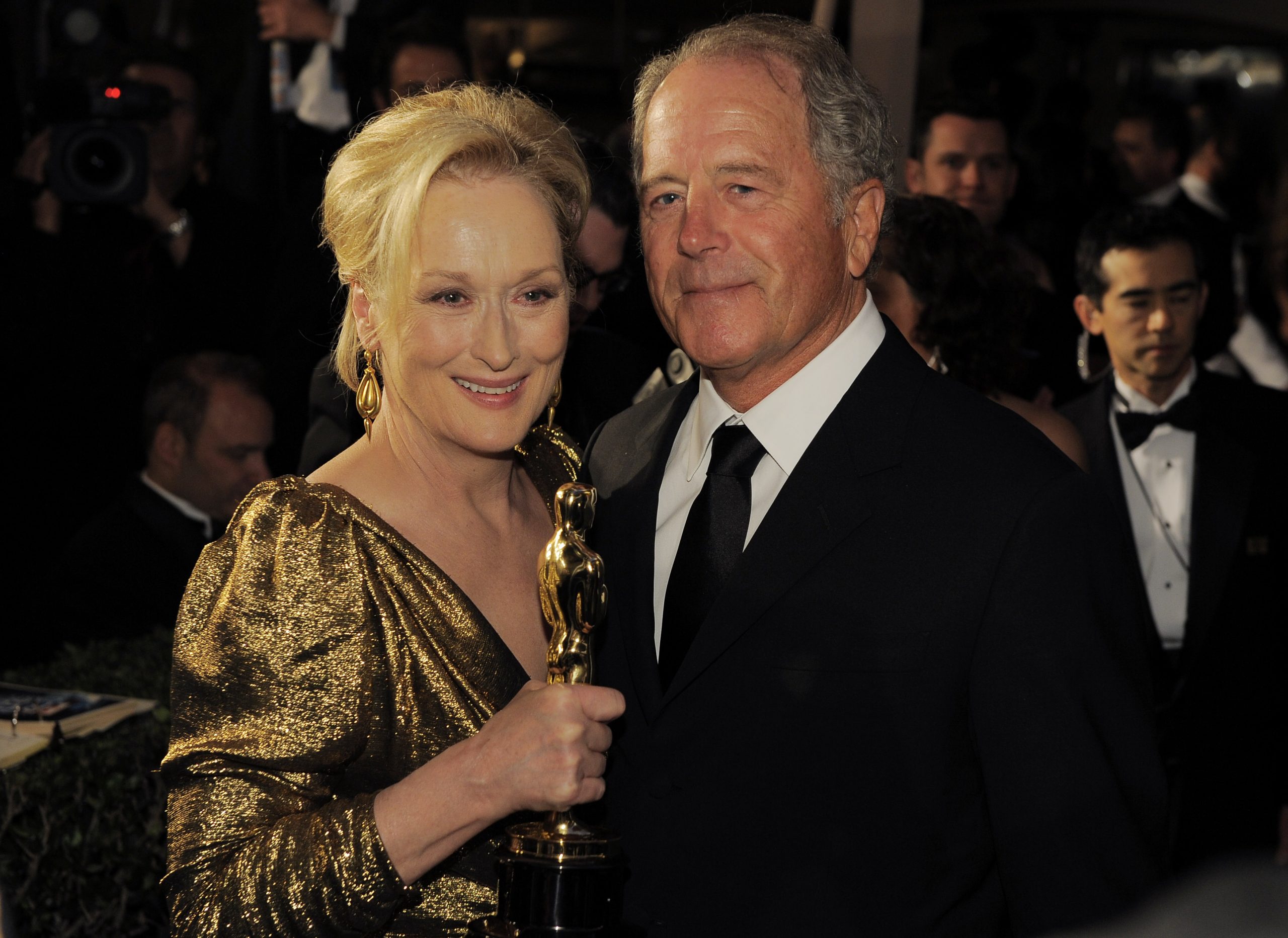 From left, Meryl Streep with the Oscar for best actress in a leading role for "The Iron Lady"  and husband Don Gummer at the Governors Ball following the 84th Academy Awards on Sunday, Feb. 26, 2012, in the Hollywood section of Los Angeles. (AP Photo/Chris Pizzello)