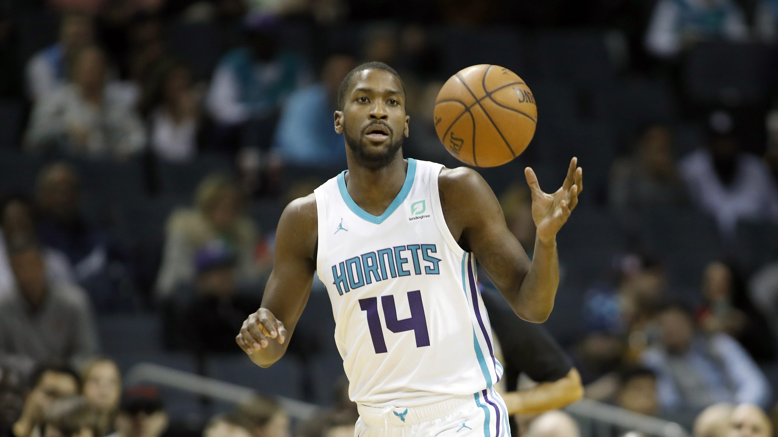 Charlotte Hornets' Michael Kidd-Gilchrist (14) brings the ball up against the Atlanta Hawks during the first half of an NBA basketball game in Charlotte, N.C., Sunday, Dec. 8, 2019. The Hawks won 122-107. (AP Photo/Bob Leverone)