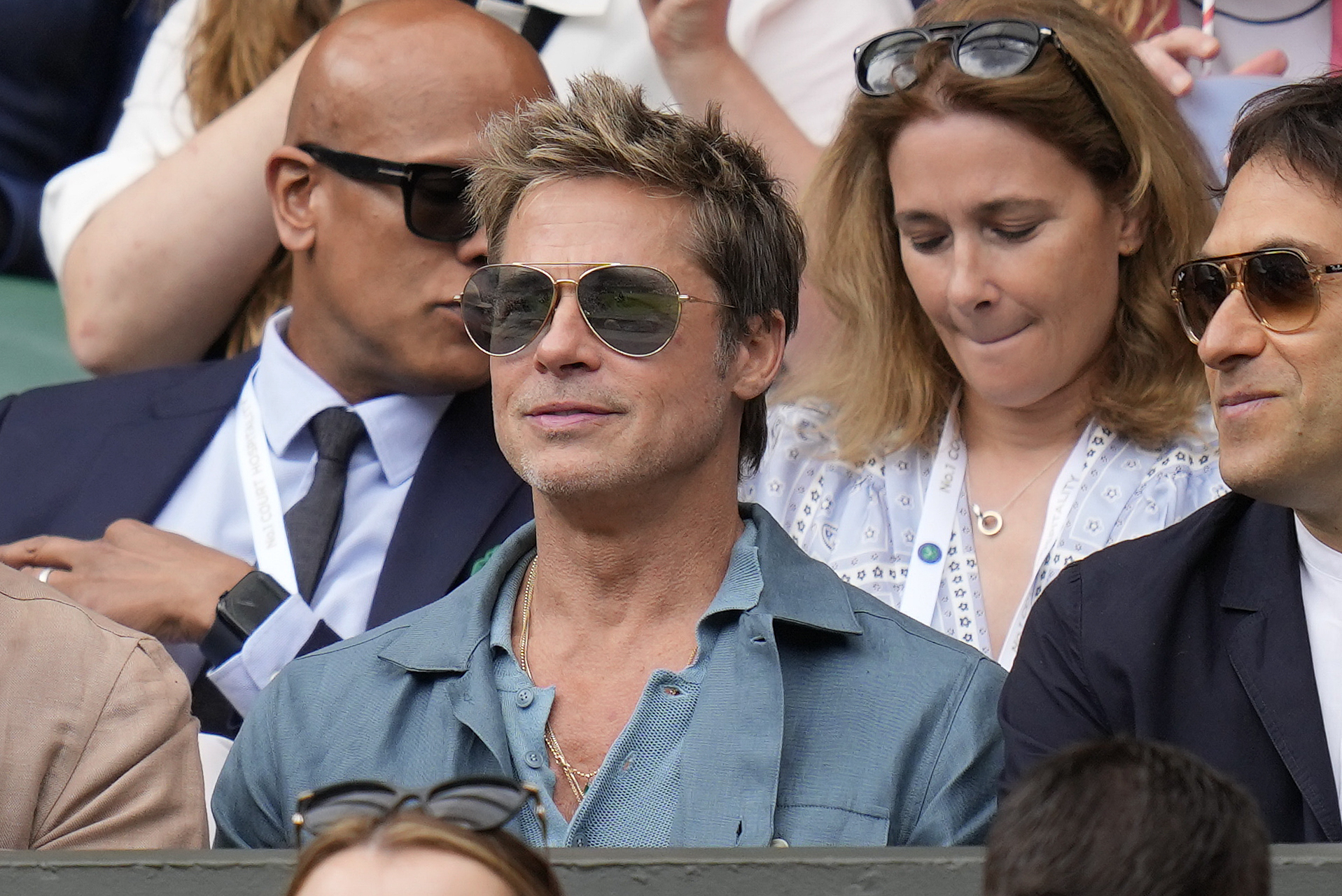 Actor Brad Pitt sits in the stands on Centre Court for the final of the men's singles between Spain's Carlos Alcaraz and Serbia's Novak Djokovic on day fourteen of the Wimbledon tennis championships in London, Sunday, July 16, 2023. (AP Photo/Kirsty Wigglesworth)