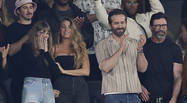 From left, Taylor Swift, Blake Lively, Ryan Reynolds and Hugh Jackman react during the first quarter of an NFL football game between the New York Jets and the Kansas City Chiefs, Sunday, Oct. 1, 2023, in East Rutherford, N.J. (AP Photo/Adam Hunger)