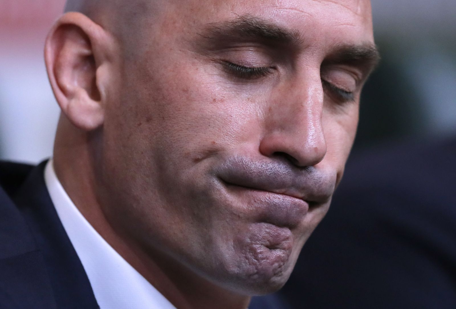 FILE - Spanish football president Luis Rubiales grimaces during a press conference at the 2018 soccer World Cup in Krasnodar, Russia, Wednesday, June 13, 2018. FIFA has banned ousted former Spanish soccer federation president Luis Rubiales from the sport for three years. He was judged for misconduct at the Women’s World Cup final where he forcibly kissed a player on the lips at the trophy ceremony. FIFA did not publish details of the verdict reached by its disciplinary committee judges. (AP Photo/Manu Fernandez, File)