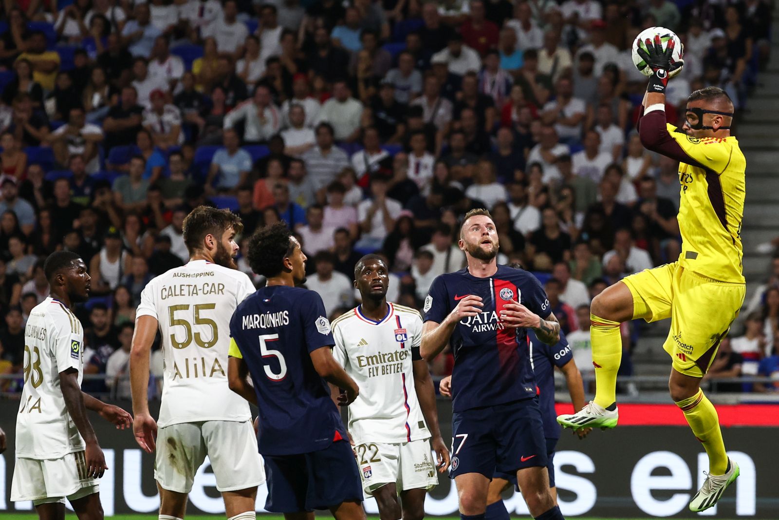 epa10838936 (L-R) Olympique Lyon's goalkeeper Anthony Lopes, Paris Saint Germain's Milan Skriniar, Olympique Lyon's Clinton Mata, Paris Saint Germain's Marquinhos, Olympique Lyon's Duje Caleta-Car and Olympique Lyon's Ainsley Maitland-Niles in action during the French Ligue 1 soccer match between Olympique Lyonnais and Paris Saint-Germain (PSG) in at the Groupama Stadium in Decines-Charpieu near Lyon, France, 03 September 2023.  EPA/MOHAMMED BADRA