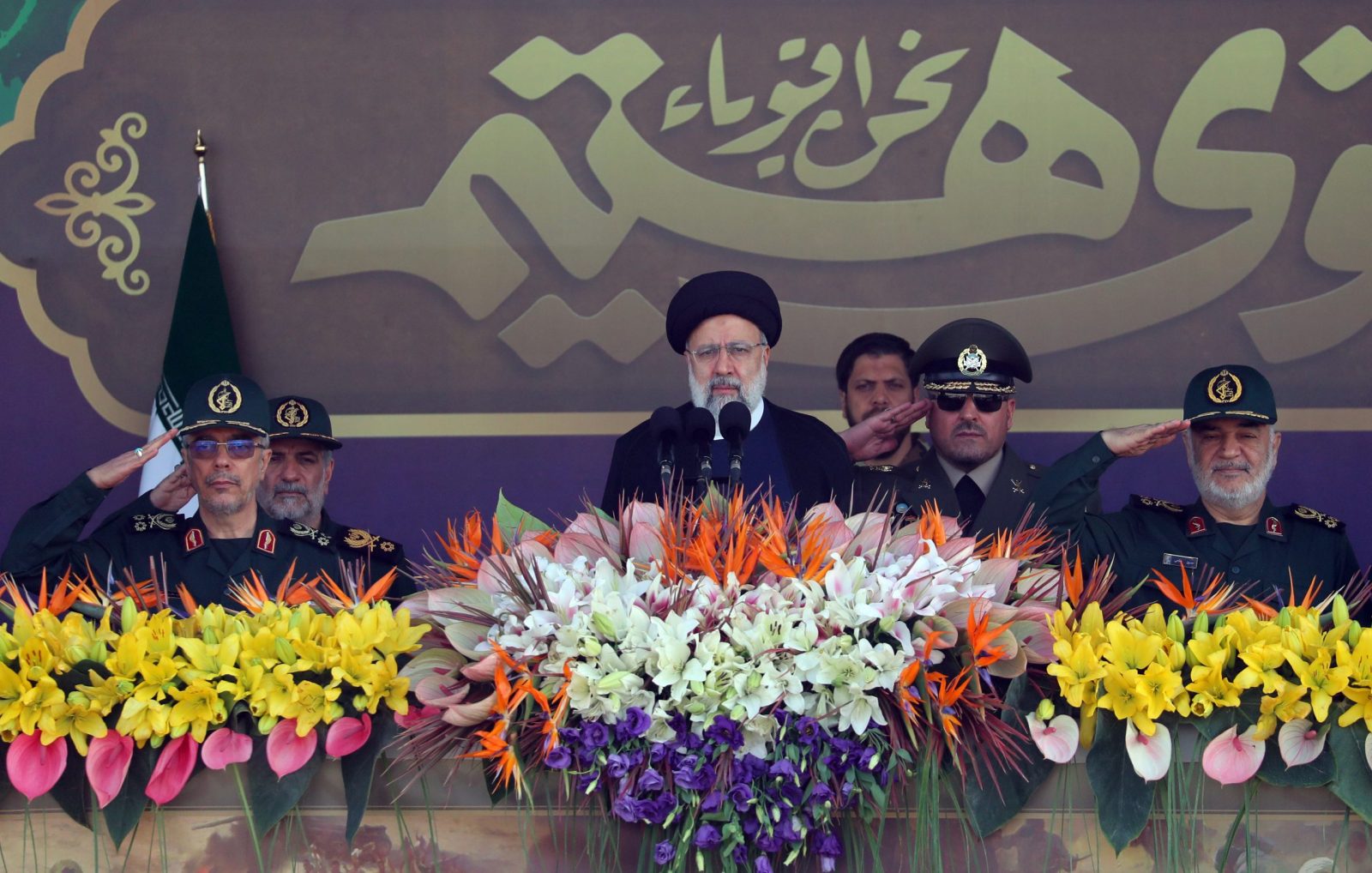 epa10876298 Iranian President Ebrahim Raisi delivers his speech during the annual military parade marking the Iraqi invasion in 1980, which led to an eight-year-long war (1980-1988), in Tehran, Iran, 22 September 2023.  EPA/ABEDIN TAHERKENAREH