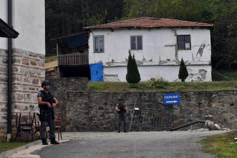 epa10885615 Armed Kosovo Police officers stand guard outside the Banjska Monastery in the village of Banjska, Kosovo, 27 September 2023. A Kosovar Albanian police officer on 24 September was killed by Serb gunmen who later barricaded themself in the XIV century Serbian Orthodox Banjska monastery and traded gunfire for hours, Kosovo authorities confirmed. Police regained control of the area late on the same day. The incident came at a fragile moment in the Kosovo - Serbia European Union-facilitated dialogue to normalize ties between the two parties.  EPA/GEORGI LICOVSKI