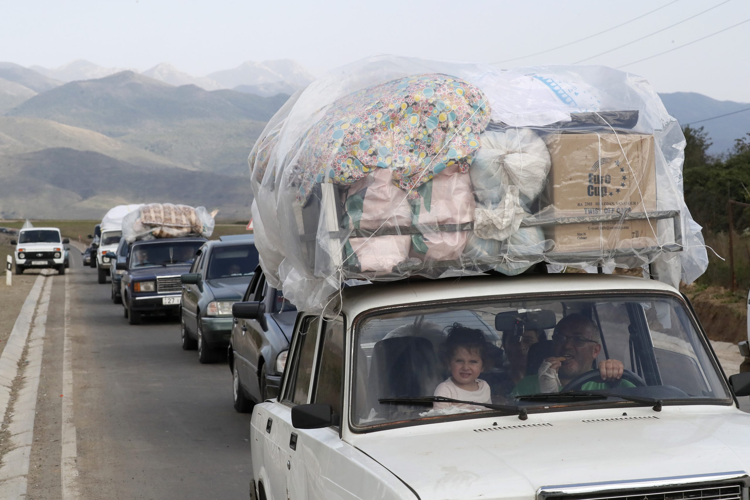 epaselect epa10890113 Ethnic Armenians from Nagorno-Karabakh cross the border with Azerbaijan by car, carrying their belongings with them, near the village of Kornidzor, Armenia, 29 September 2023. Azerbaijan on 19 September 2023 launched a brief military offensive on the contested region of Nagorno-Karabakh, a breakaway enclave that is home to some 120,000 ethnic Armenians. Following a ceasefire agreed on 20 September 2023, Azerbaijan opened all checkpoints with Armenia for the unimpeded exit of civilians from the disputed territory. The Armenian government announced the evacuation of more than 85,000 local residents from Nagorno-Karabakh, and a humanitarian center has been set up in the village of Kornidzor near the so-called Lachin corridor, the main route between Armenia and the breakaway region. Nagorno-Karabakh will 'cease to exist' as a self-proclaimed state from 01 January 2024, the region's separatist leader, Samvel Shakhramanyan, announced on 28 September, after signing a decree to dissolve all its institutions.  EPA/ANATOLY MALTSEV