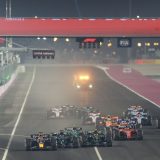 epa10908045 Dutch Formula One driver Max Verstappen (L) of Red Bull Racing leads the pack into turn 1 after the start of the Formula 1 Qatar Grand Prix in Lusail, Qatar, 08 October 2023.  EPA/ALI HAIDER