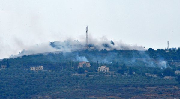 epa10913224 Smoke rises from positions on a hill after Israeli shelling on the outskirts of Dhayra village, near the Lebanese-Israeli border, Lebanon, 11 October 2023. Hezbollah said on 11 October it fired missiles on Israel, two days after three of its members were killed in border towns. The Israel Defence Forces (IDF) said an anti-tank missile was launched from Lebanon toward a military post adjacent to the community of Arab Al-Aramshe on the BlueLine, and it responded by shelling Southern Lebanese towns.  EPA/WAEL HAMZEH