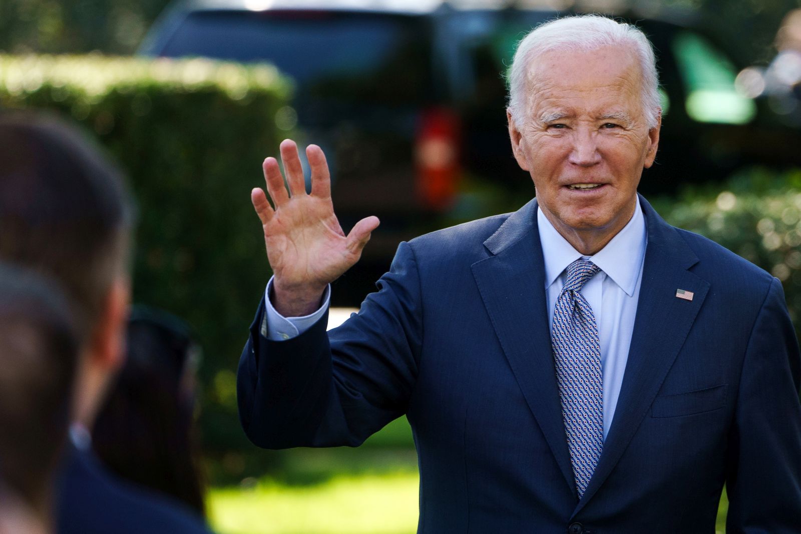 epa10913614 US President Joe Biden waves after delivering remarks on consumer protections in the Rose Garden of the White House in Washington, DC, USA, 11 October 2023. President Biden announced new measures targeted against hidden junk fees affecting consumers.  EPA/WILL OLIVER