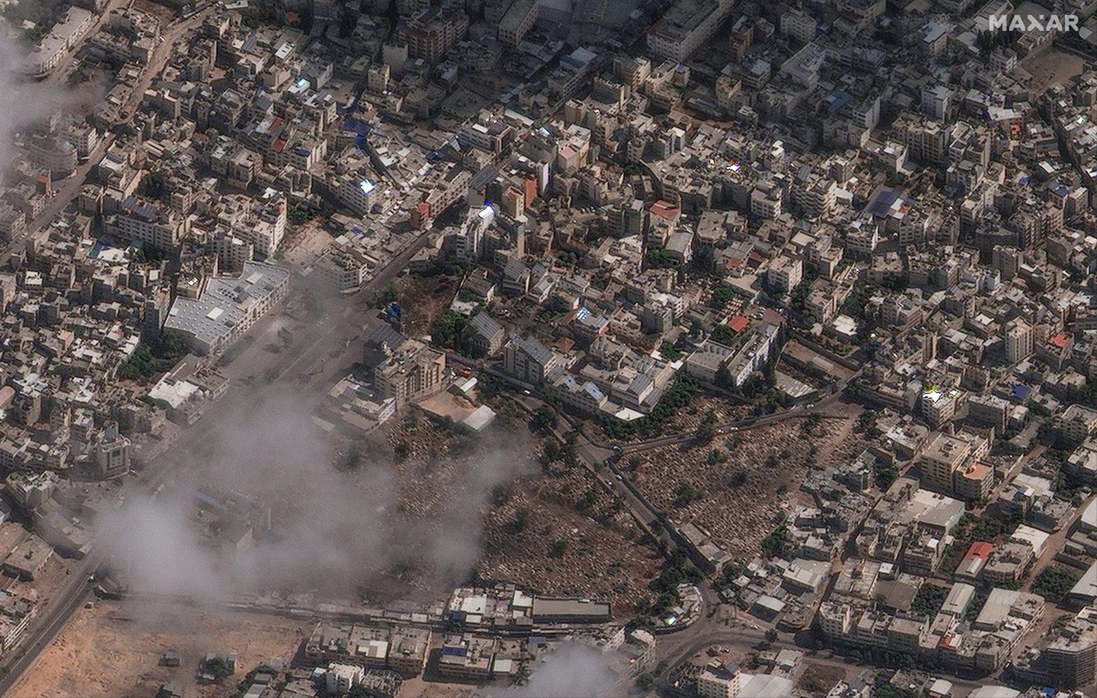 epa10925607 A handout photo made available 18 October 2023 by Maxar Technologies shows a satellite view of Al Ahli hospital after the explosion which occured one day earlier, Gaza, 18 October 2023. According to Palestinian authorities in Gaza hundreds of people have been killed in an airstrike to the hospital in Gaza on 17 October. Israel on 18 October, has denied responsibility and said a Palestinan Islamic Jihad rocket misfire caused the blast. More than 3,000 Palestinians and 1,400 Israelis have been killed according to the Israel Defense Forces (IDF) and the Palestinian Health authority since Hamas militants launched an attack against Israel from the Gaza Strip on 07 October. Israel has warned all citizens of the Gaza Strip to move to the south ahead of an expected invasion.  EPA/MAXAR TECHNOLOGIES Satellite image ©2023 Maxar Technologies  HANDOUT EDITORIAL USE ONLY/NO SALES HANDOUT EDITORIAL USE ONLY/NO SALES