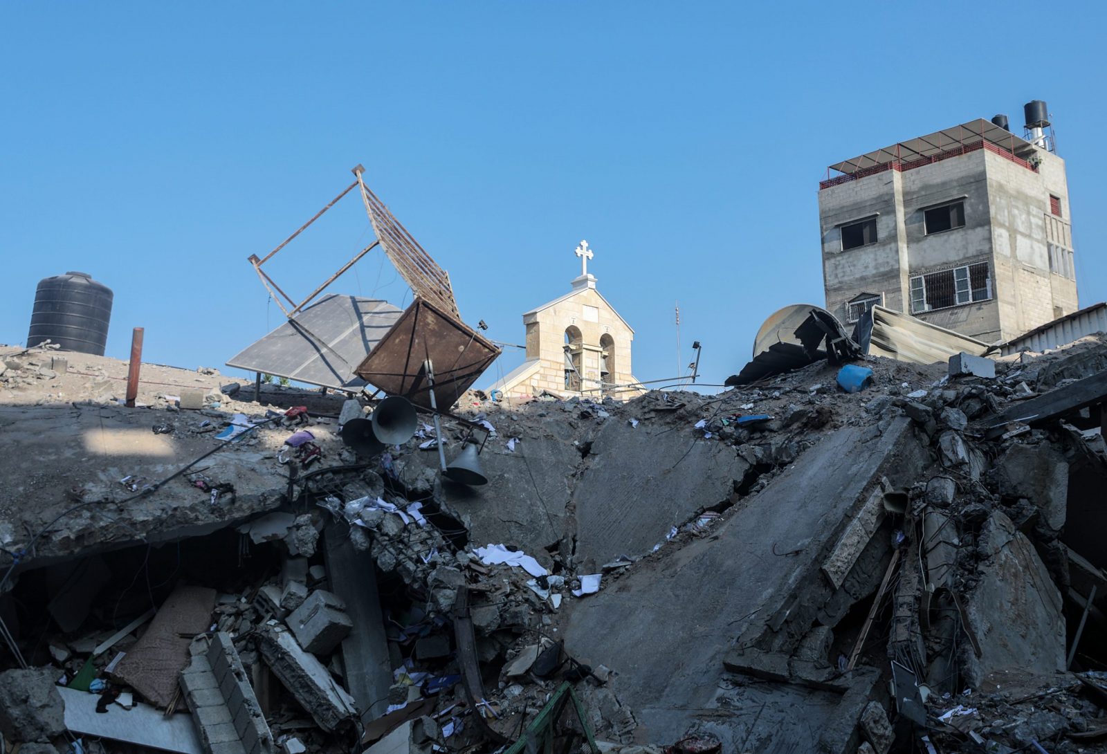 epa10928617 The damaged Greek Orthodox Saint Porphyrius Church following an overnight airstrike in Gaza, 20 October 2023. At least 18 people were killed, according to Palestinian authorities in Gaza. More than 3,700 Palestinians and 1,400 Israelis have been killed according to the Israel Defense Forces (IDF) and the Palestinian health authority since Hamas militants launched an attack against Israel from the Gaza Strip on 07 October. Israel has warned all citizens of the Gaza Strip to move to the south ahead of an expected invasion.  EPA/MOHAMMED SABER