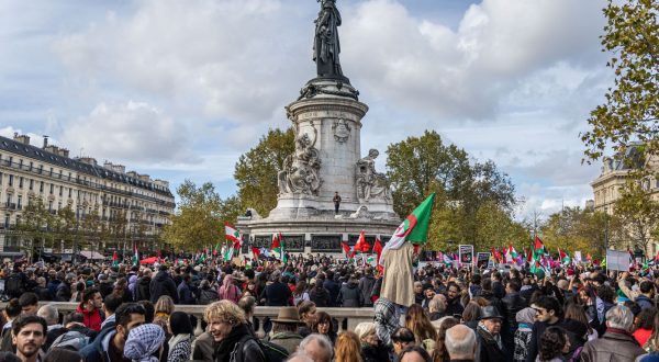epa10932991 Protesters hold Palestinian flags during a demonstration to support Palestine, at the Place de la Republique in Paris, France, 22 October 2023. Thousands of Israelis and Palestinians have died since the militant group Hamas launched an unprecedented attack on Israel from the Gaza Strip on 07 October, and the Israeli strikes on the Palestinian enclave which followed it.  EPA/CHRISTOPHE PETIT TESSON