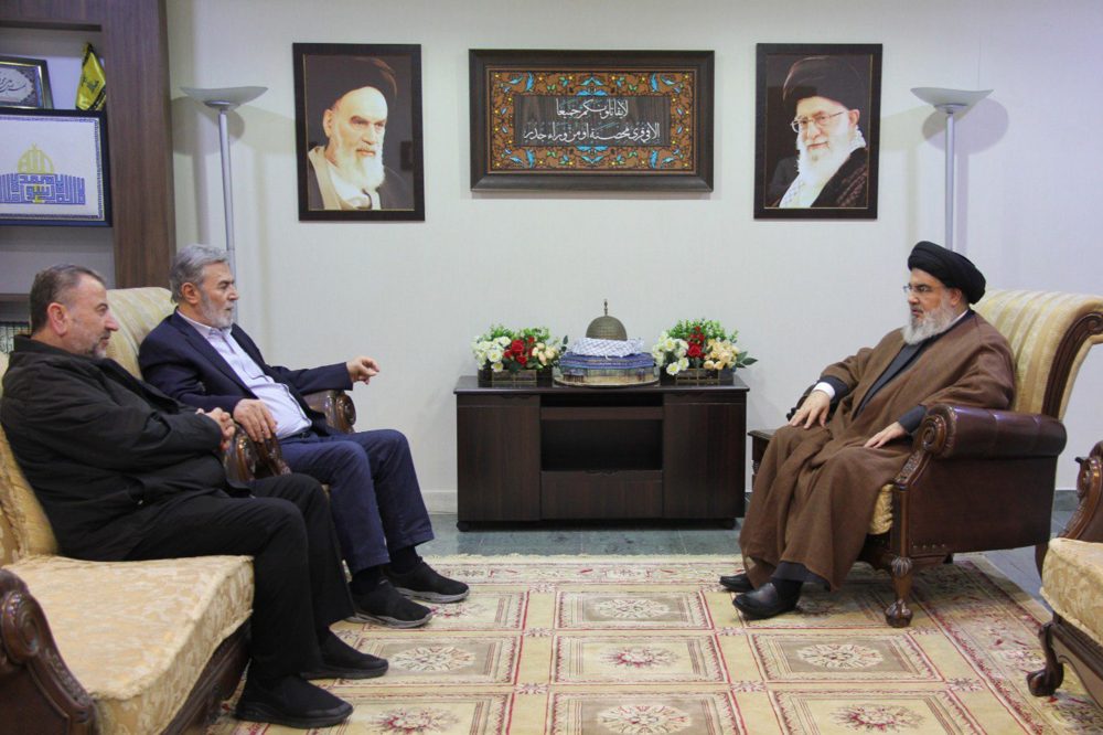epa10937660 A handout photo made available by the Hezbollah Media Relations Office shows Hezbollah leader Sayyed Hassan Nasrallah (R) meeting with Palestinian Islamic Jihad (PIJ) Secretary General Ziyad al-Nakhalah (2-L) and deputy leader of Hamas, Sheikh Saleh al-Arouri (L), at an undisclosed location in Beirut, Lebanon, 25 October 2023. Hezbollah leader Sayyed Hassan Nasrallah met with senior Hamas and PIJ officials for the first time on 25 October since the conflict between Israel and Hamas escalated on 07 October and fighting started at the Lebanese-Israeli border.  EPA/HEZBOLLAH MEDIA OFFICE HANDOUT  HANDOUT EDITORIAL USE ONLY/NO SALES HANDOUT EDITORIAL USE ONLY/NO SALES