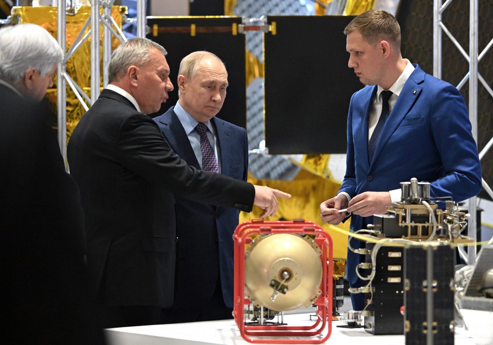 epa10941230 Russian President Vladimir Putin (2-R), accompanied by the Head of Russian state space corporation Roscosmos Yuri Borisov (2-L), visits the Rocket and Space Corporation (RSC) Energia in Korolyov, outside Moscow, Russia, 26 October 2023. The Russian rocket and space industry is moving to conveyor assembly of satellites; more than 2 thousand spacecraft are planned to be launched into low-Earth orbit by 2036.  EPA/GRIGORY SYSOEV / SPUTNIK / KREMLIN POOL MANDATORY CREDIT