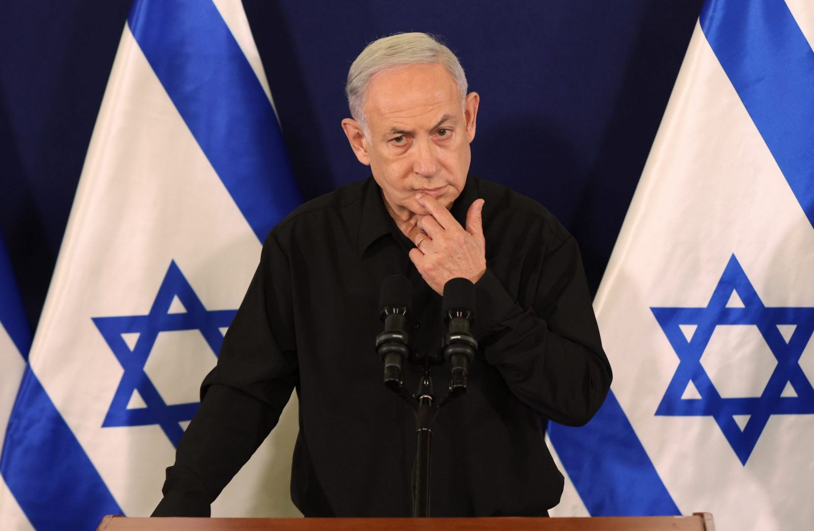 epa10945783 Israel's Prime Minister Benjamin Netanyahu addresses a press conference in The Kirya military base in Tel Aviv, Israel, 28 October 2023.  EPA/ABIR SULTAN / POOL