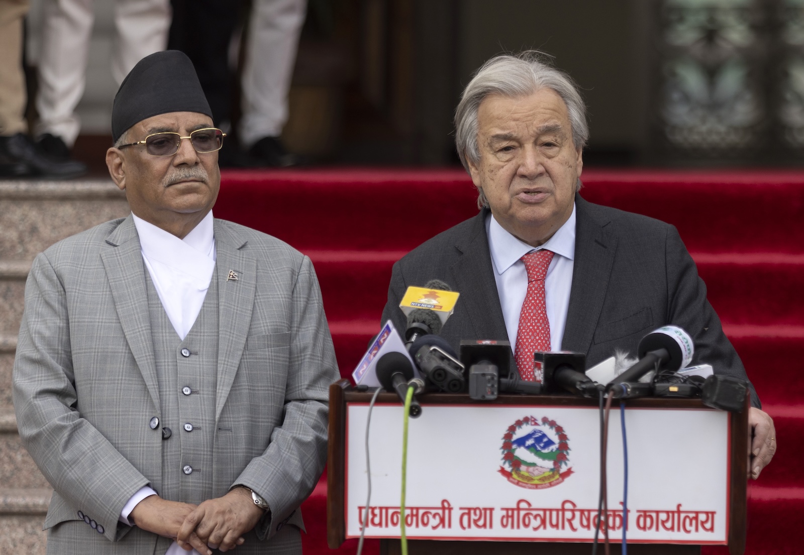 epa10947227 United Nations Secretary-General Antonio Guterres (R) talks to the media after his bilateral meeting with Nepal's Prime Minister Pushpa Kamal Dahal (L) at the Office of the Prime Minister, Singha Durbar in Kathmandu, Nepal, 29 October 2023. Guterres arrive in Kathmandu for four-day official visit.  EPA/NARENDRA SHRESTHA