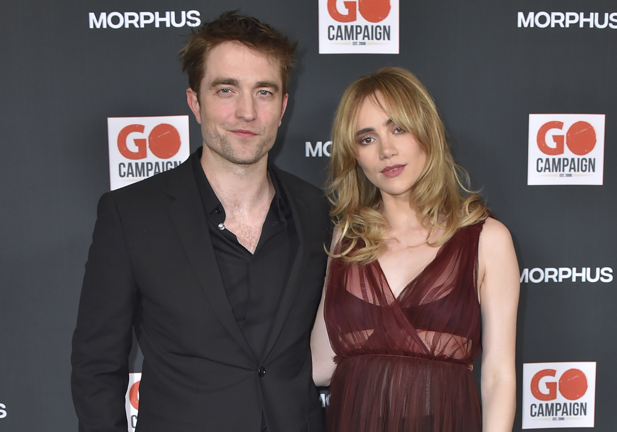 Robert Pattinson, left, and Suki Waterhouse arrive at the GO Campaign's annual GO Gala on Saturday, Oct. 21, 2023, in Los Angeles. (Photo by Jordan Strauss/Invision/AP)
