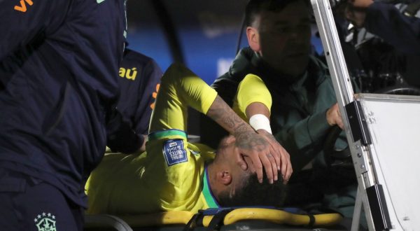 epa10924730 Brazil's Neymar reacts while being assisted to leave the field for a possible injury during a CONMEBOL FIFA World Cup 2026 qualifier soccer match between Uruguay and Brazil at Centenario stadium in Montevideo, Uruguay, 17 October 2023.  EPA/Raul Martinez