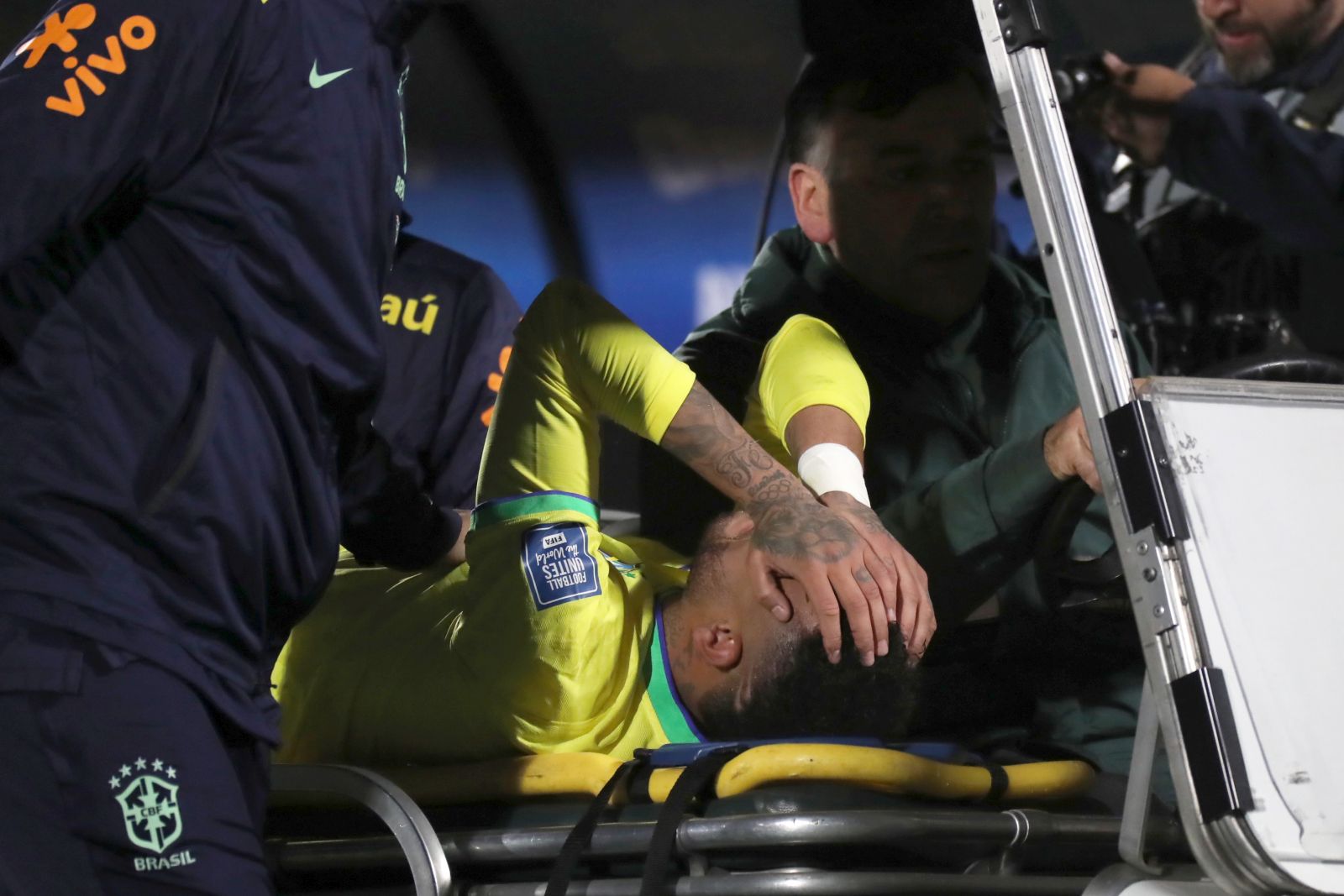 epa10924730 Brazil's Neymar reacts while being assisted to leave the field for a possible injury during a CONMEBOL FIFA World Cup 2026 qualifier soccer match between Uruguay and Brazil at Centenario stadium in Montevideo, Uruguay, 17 October 2023.  EPA/Raul Martinez
