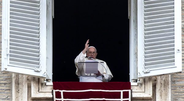 epa10952685 Pope Francis gestures as he leads the Angelus prayer from the window of his office overlooking Saint Peter's Square, in Vatican City, 01 November 2023, on the Solemnity of All Saints.  EPA/ANGELO CARCONI