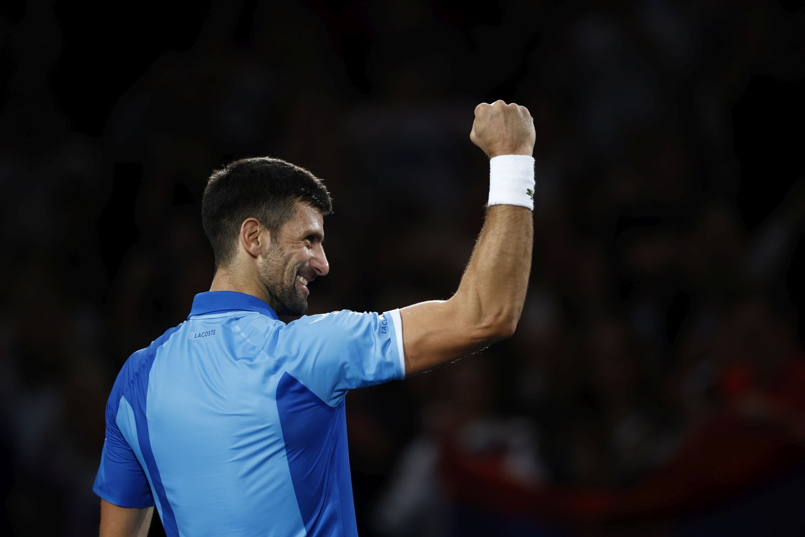 epa10959545 Novak Djokovic of Serbia celebrates winning his final match against Grigor Dimitrov of Bulgaria at the Paris Masters tennis tournament, in Paris, France, 05 November 2023.  EPA/YOAN VALAT