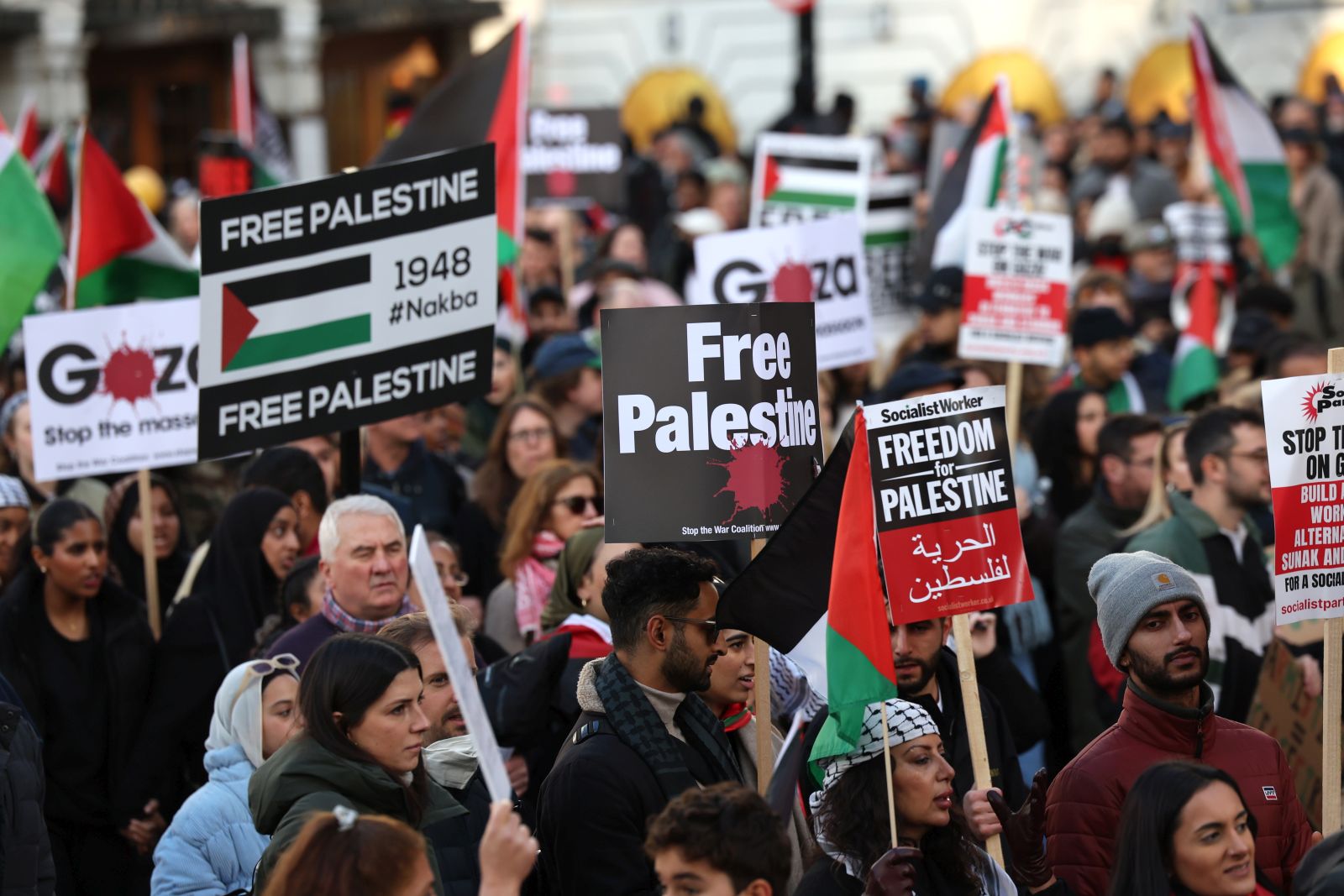 epa10970005 People participate in the Pro-Palestinian march in London, Britain, 11 November 2023. A coalition of groups are behind the march including the Palestine Solidarity Campaign, Friends of Al-Aqsa, Stop the War Coalition, Muslim Association of Britain, Palestinian Forum in Britain and Campaign for Nuclear Disarmament. The route for the march was changed to avoid any clashes with the commemorations for Armistice Day at the Cenotaph. Thousands of Israelis and Palestinians have died since the militant group Hamas launched an unprecedented attack on Israel from the Gaza Strip on 07 October, and the Israeli strikes on the Palestinian enclave which followed it.  EPA/ANDY RAIN