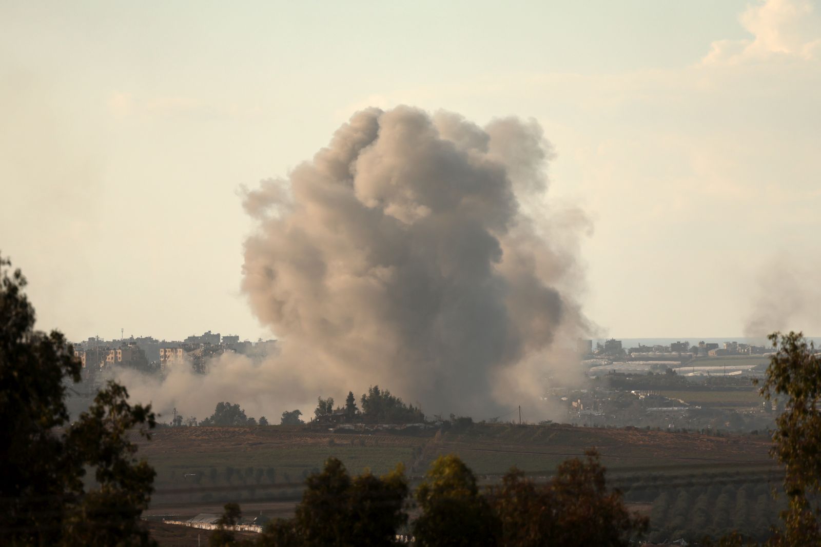epa10976231 Smoke billows following an air strike on the northern part of the Gaza Strip, as seen from the Sderot, southern Israel, 15 November 2023. More than 11,100 Palestinians and at least 1,200 Israelis have been killed, according to the Israel Defense Forces (IDF) and the Palestinian health authority, since Hamas militants launched an attack against Israel from the Gaza Strip on 07 October, and the Israeli operations in Gaza and the West Bank which followed it.  EPA/ATEF SAFADI