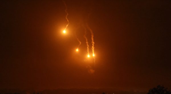 epa10976612 Flares over Beit Hanoun, in the northern Gaza Strip, as seen from Sderot, southern Israel, 15 November 2023. More than 11,000 Palestinians and at least 1,200 Israelis have been killed, according to the Israel Defense Forces (IDF) and the Palestinian health authority, since Hamas militants launched an attack against Israel from the Gaza Strip on 07 October, and the Israeli operations in Gaza and the West Bank which followed it.  EPA/ATEF SAFADI