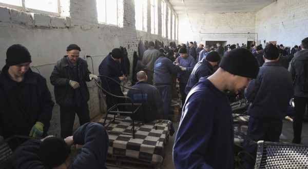 epa10979285 Russian prisoners of war make furniture inside a detention center at an undisclosed location in the Lviv region, western Ukraine, 16 November 2023. Russia and Ukraine have been accusing each other of abusing and mistreating their respective prisoners of war, prompting a UN investigation in early 2023. A new camp will be opened for Russian prisoners of war in Ukraine due to the large number of them, the head of the Ministry of Justice, Denys Malyuska, announced 16 November. About 10,000 UAH (~250 EUR) per month are spent on the maintenance of one Russian soldier captured by Ukraine, the Ministry of Justice reported in the spring of 2023. Russian troops entered Ukrainian territory in February 2022, starting a conflict that has provoked destruction and a humanitarian crisis.  EPA/YAKIV LIASHENKO  ATTENTION: This Image is part of a PHOTO SET