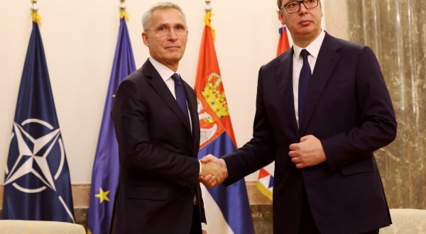 epa10987117 Serbian President Aleksandar Vucic (R) shakes hands with NATO Secretary General Jens Stoltenberg (L) before their meeting in Belgrade, Serbia, 21 November 2023.  EPA/ANDREJ CUKIC