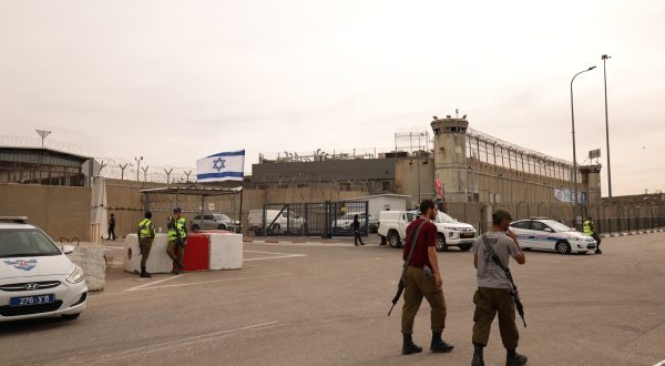 epa10993950 Israeli security guards the military prison of Ofer near Jerusalem, Israel, 25 November 2023, ahead of an expected release of Palestinian prisoners. Israel and Hamas agreed to a four-day ceasefire, with 50 Israeli hostages, women and children, to be released by Hamas. 150 Palestinian women and children detained in Israeli prisons are to be released in exchange. More than 14,000 Palestinians and at least 1,200 Israelis have been killed, according to the Gaza Government media office and the Israel Defense Forces (IDF), since Hamas militants launched an attack against Israel from the Gaza Strip on 07 October, and the Israeli operations in Gaza and the West Bank which followed it.  EPA/ATEF SAFADI