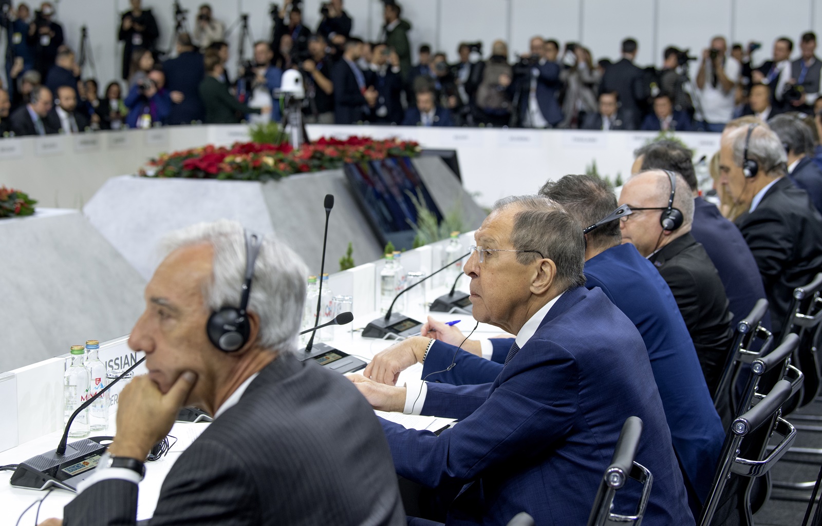 epa11003186 Russian Foreign Minister Sergei Lavrov (C) attends the 30th OSCE Ministerial Meeting in Skopje, Republic of North Macedonia, 30 November 2023. The Ministerial Council meets once a year towards the end of every term of chairmanship to consider issues on the OSCE agenda and adopt relevant documents. The 30th OSCE Ministerial Council takes place on 30 November and 01 December 2023.  EPA/GEORGI LICOVSKI