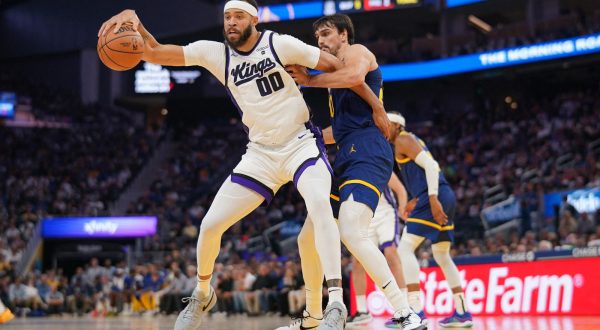 Nov 1, 2023; San Francisco, California, USA; Sacramento Kings center JaVale McGee (00) dribbles the ball in front of Golden State Warriors forward Dario Saric (20) in the first quarter at the Chase Center. Mandatory Credit: Cary Edmondson-USA TODAY Sports Photo: Cary Edmondson/REUTERS