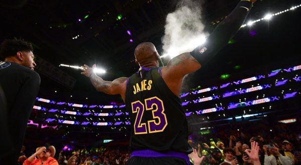 Nov 21, 2023; Los Angeles, California, USA; Los Angeles Lakers forward LeBron James (23) tosses. up powder before playing against the Utah Jazz at Crypto.com Arena. Mandatory Credit: Gary A. Vasquez-USA TODAY Sports Photo: Gary A. Vasquez/REUTERS