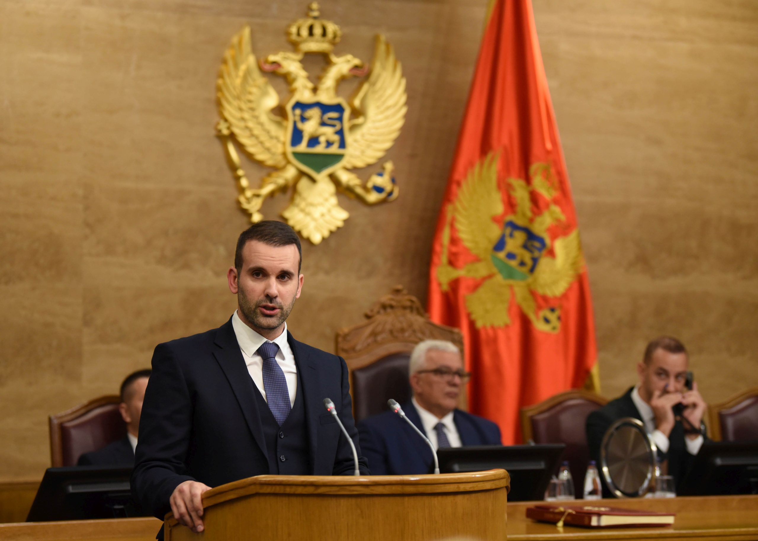 epa10949726 Montenegro's Prime Minister designate Milojko Spajic addresses the Parliament in Podgorica, Montenegro, 30 October 2023. Spajic announced his candidates for ministerial positions. Europe Now party President and Prime Minister designate Milojko Spajic managed to form a coalition government after the snap parliamentary elections on 11 June 2023.  EPA/BORIS PEJOVIC